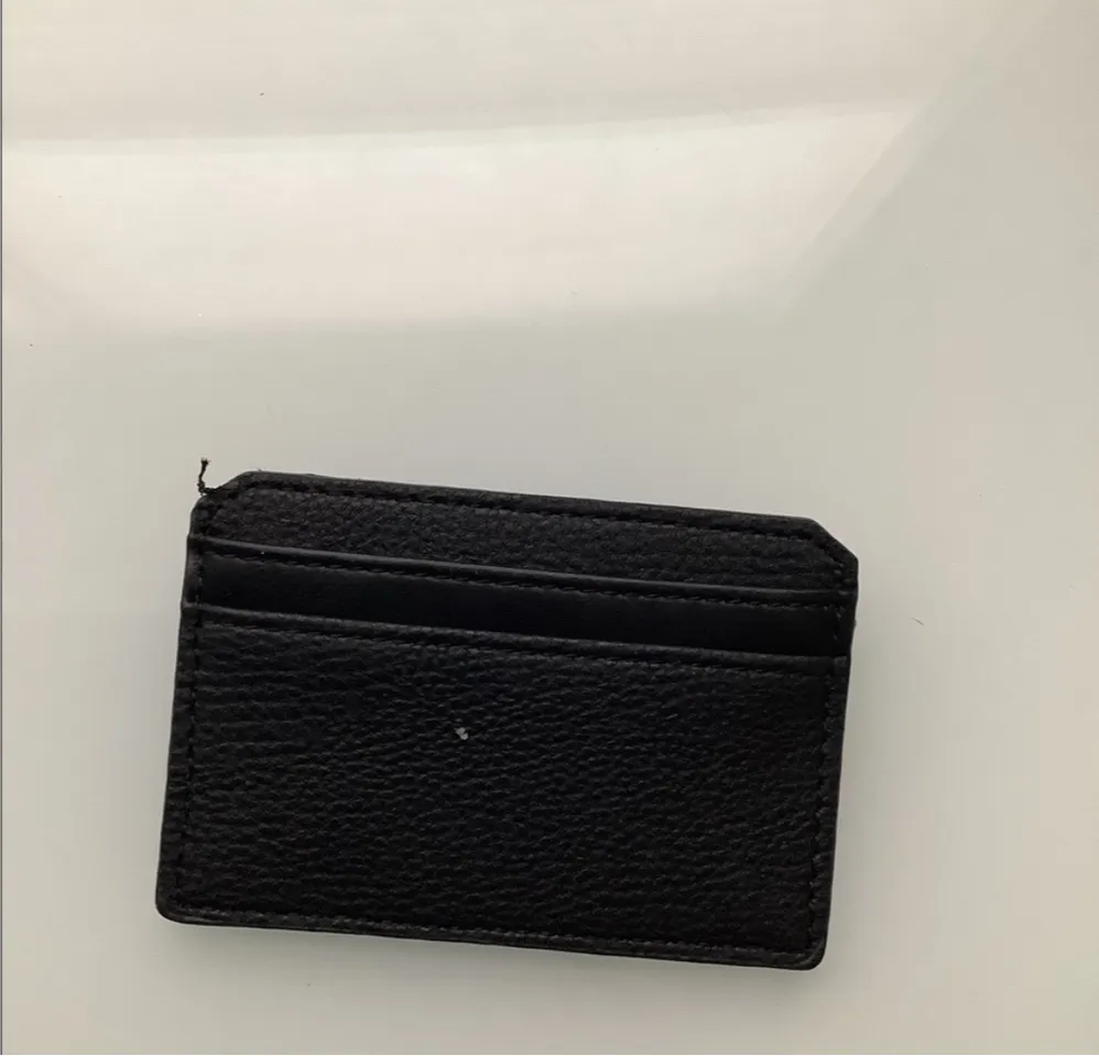 - Tommy Hilfiger  men wallet